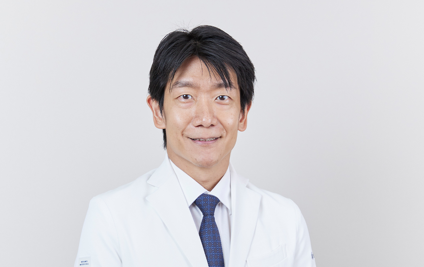 医師 小島 孝太